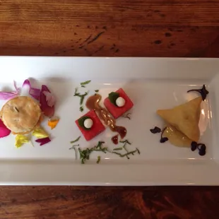 Fried green tomato biscuit, watermelon bites, samosa triangle