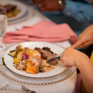 An amazing meal by Caterman! Prawn stuffed salmon, Prime Rib, mouthwatering scalloped potatoes!