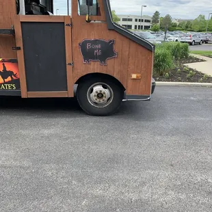 Funny "Bone Me" sign.