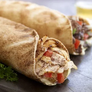 wo burritos on a plate