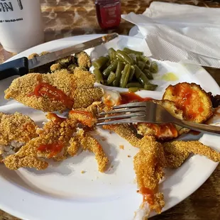 Catfish, beans, okra, and hush puppies.