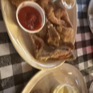 Cabin Platter with catfish strips, baked potato and chicken nuggets.