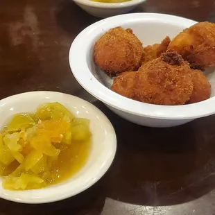Pickled green tomatoes and hush puppies, free app.