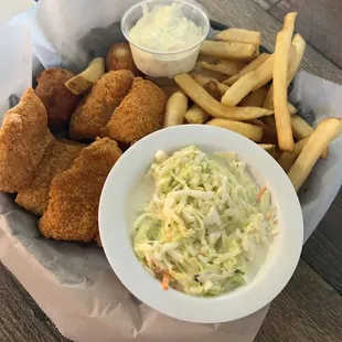 Fish basket, with slaw and hush puppies.