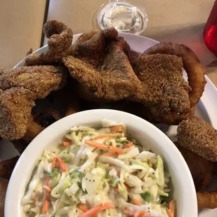Cajun catfish dinner, coleslaw and onion rings