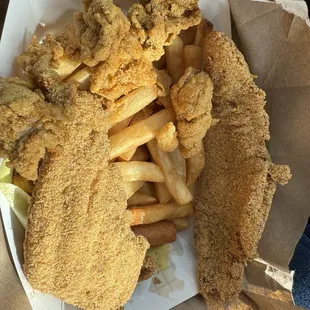 2 piece fried catfish, 4 fried oysters, and fries. Everything was delicious! Will definitely be back for more!