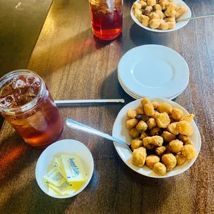 two plates of food and a drink