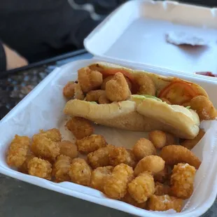 Shrimp po' boy with tater tots