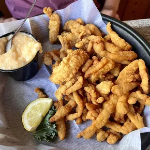 Fried gator, catfish and clams with cheese grits.