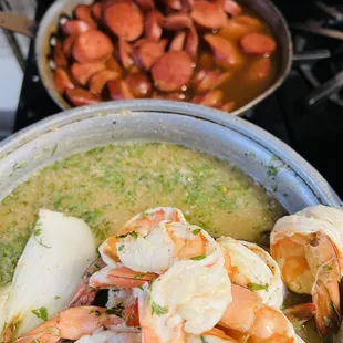 a bowl of shrimp and broth