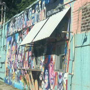 Exterior wall with black history mural.