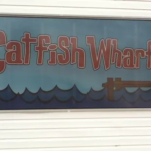 a sign on the side of a building