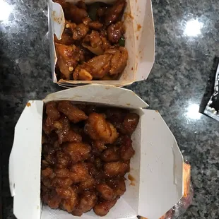 Jalapeño chicken and wrong order of orange chicken because we ordered spicy garlic chicken!