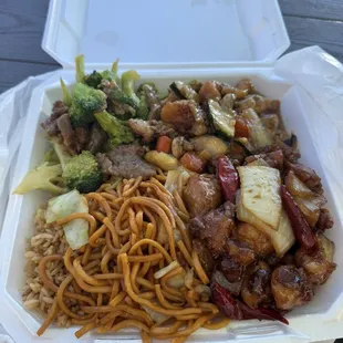 Three item plate. Half rice half noodles with Beef with broccoli, mushroom chicken and kung pao chicken. Delicious!
