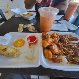 Orange chicken, chicken egg roll, chow mein, and thai Ice tea