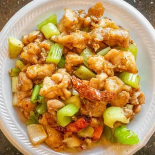 a plate of chicken and celery