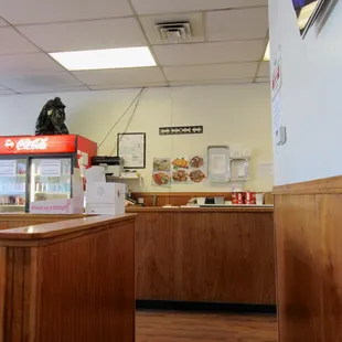 canned beverages in a cooler / order and pick-up counter