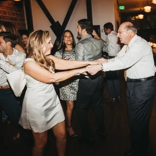 Filling the dance floor with lots of love and smooth moves!

Photography by Yuriy Manchik.