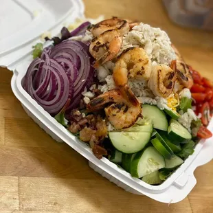 a meal in a styrofoam container