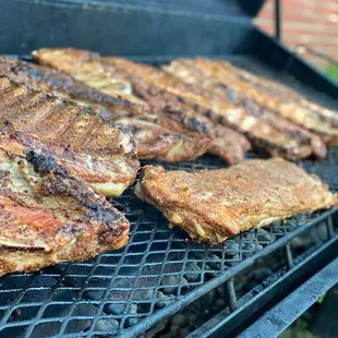 steaks on a grill