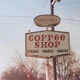 a sign for coffee shop