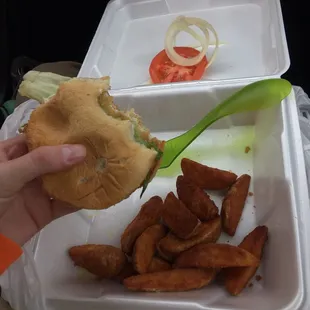 Grilled chicken sandwich with potato wedges (cupboard salad not pictured)