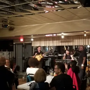 a group of people playing music