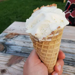 Waffle cone with salted caramel ice cream
