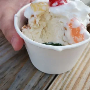 Sundae. Believe it or not, that pale-colored ice cream is strawberry.