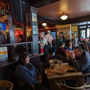 a group of people sitting at a table