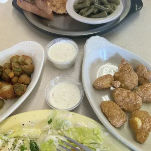 Okra. Corn nuggets.   Side salad with ranch.   Mashed potatoes with Texas toast, green beans, and chicken