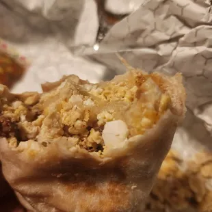 Hashbrown burrito. Missing hashbrowns were substituted with eggshells I guess.