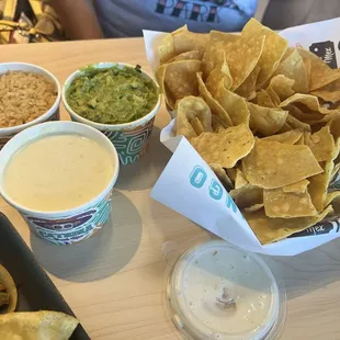 Side of Rice: Very flavorful / Queso: Very creamy, good flavor / Guacamole: A bit limey but good / Chips: Pretty good