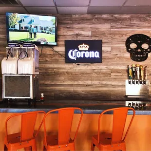 Draft beers and bar seating area