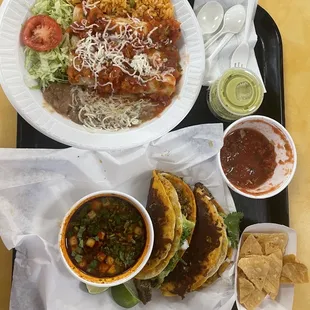 Chicken enchiladas and birria tacos. Pretty good!!!!