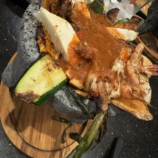 Molcajete mixteado (steak, chicken and shrimp for the proteins)