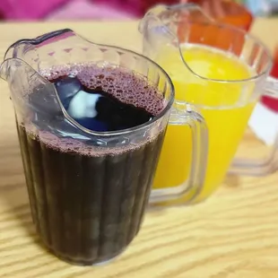 Aguas Frescas on the left Jamaica(hibiscus) on the right piña (pineapple)