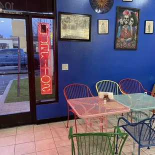a colorful table and chairs