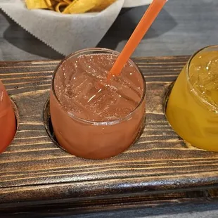 Happy hour margarita flight.  Variety of flavors. Raspberry. Strawberry and Mango