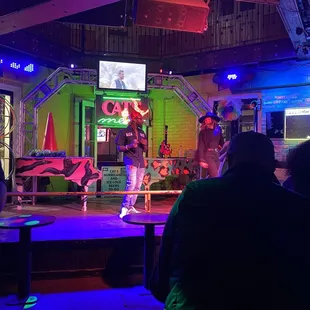 a group of people on stage