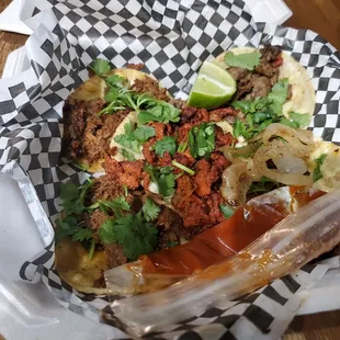 Tacos birria, pastor, and Asado