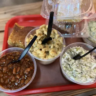 Burnt ends beans, Hatch chili mac n cheese and vinegar based coleslaw  Crack cake and peanut Oreo pie