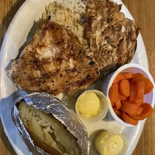 Gluten free options grilled chicken over rice, backed potato and carrots