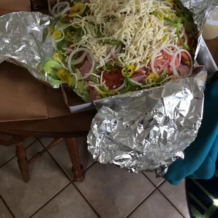 To give some perspective as to how big Cattleman&apos;s Antipasto salad is, you can see the pizza box they put it in