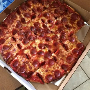 Large Pepperoni and Mushroom pizza that is so good and full of pepperoni