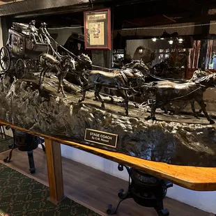 Stagecoach as you walk toward the Hostess desk