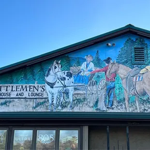 a painted mural on the side of a building