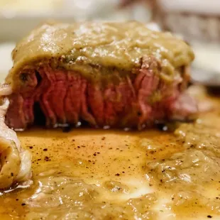 Moi Favorite steak is the petit bacon wrapped filet Mignon with peppercorn sauce. excellent. get it! :)'