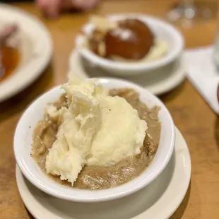 Mashed potatoes with peppercorn sauce. came both on side, Put together/better than the brown gravy. Get the peppercorn.