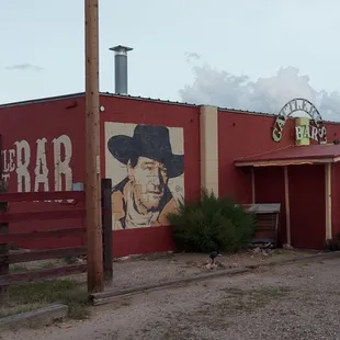 The outside of the saloon.